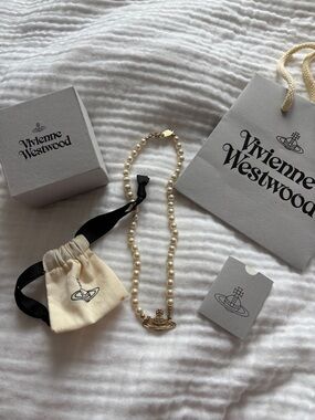 Authentic Vivienne Westwood Pearl Necklace with Gold Orb Pendant